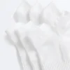 3 paires de chaussettes de sport en mélange de polyamide avec languette au talon 3 paires de chaussettes de sport en mélange de polyamide avec languette au talon