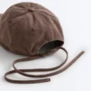 Casquette effet délavé 100 % coton avec cordon Casquette effet délavé 100 % coton avec cordon