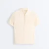Chemise à manches courtes en maille ajourée Chemise à manches courtes en maille ajourée