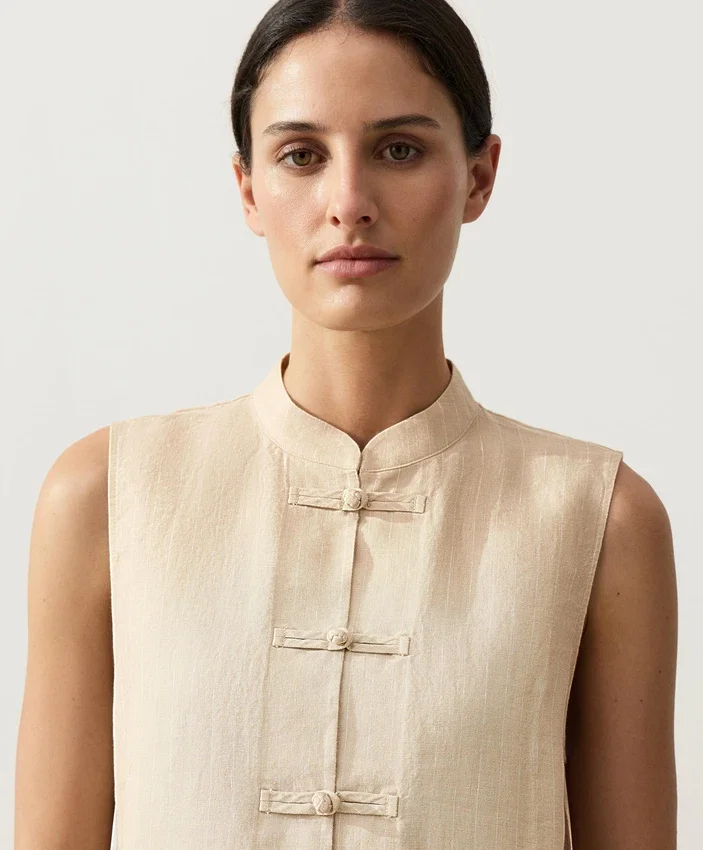 Chemise sans manches 100 % lin à col montant et boutons Chemise sans manches 100 % lin à col montant et boutons