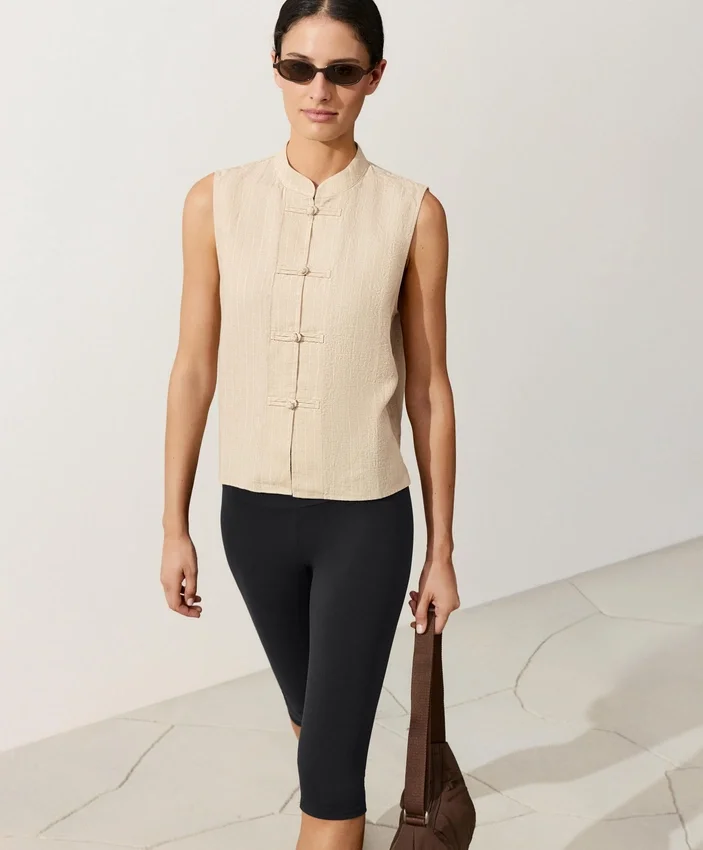 Chemise sans manches 100 % lin à col montant et boutons Chemise sans manches 100 % lin à col montant et boutons