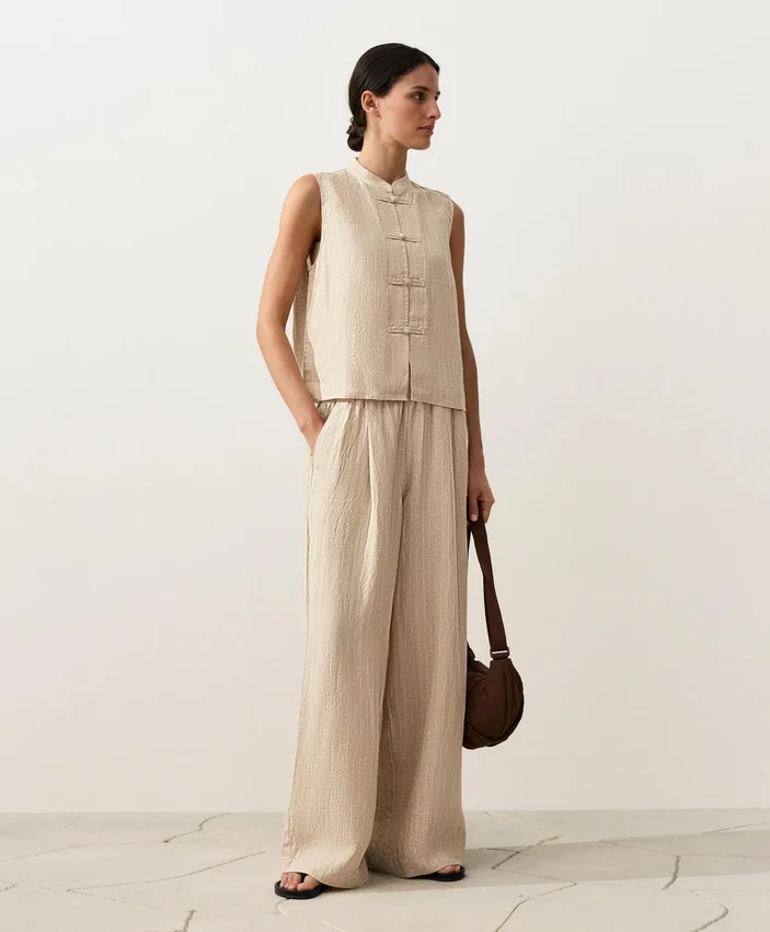 Chemise sans manches 100 % lin à col montant et boutons Chemise sans manches 100 % lin à col montant et boutons