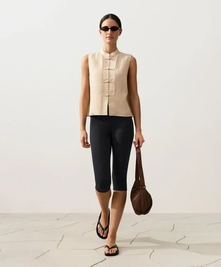 Chemise sans manches 100 % lin à col montant et boutons Chemise sans manches 100 % lin à col montant et boutons
