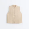 Chemise sans manches 100 % lin à col montant et boutons Chemise sans manches 100 % lin à col montant et boutons