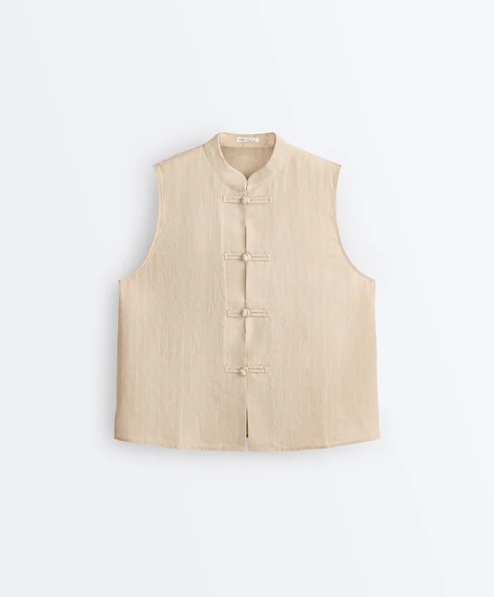 Chemise sans manches 100 % lin à col montant et boutons Chemise sans manches 100 % lin à col montant et boutons