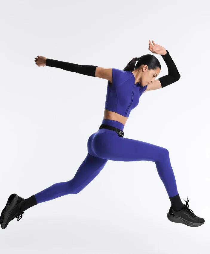 Compressive Leggings à taille haute et longueur cheville avec détails réfléchissants Compressive Leggings à taille haute et longueur cheville avec détails réfléchissants