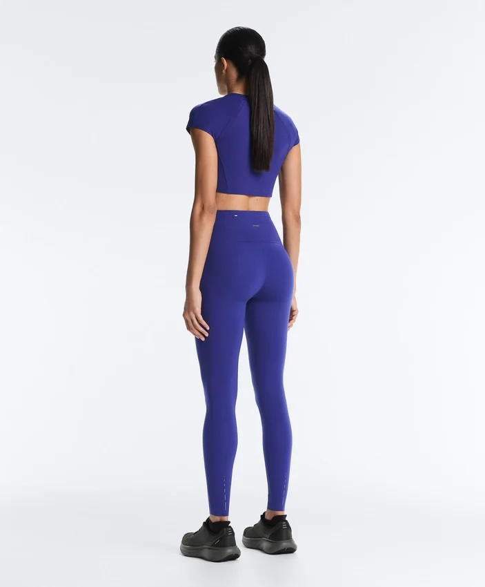 Compressive Leggings à taille haute et longueur cheville avec détails réfléchissants Compressive Leggings à taille haute et longueur cheville avec détails réfléchissants