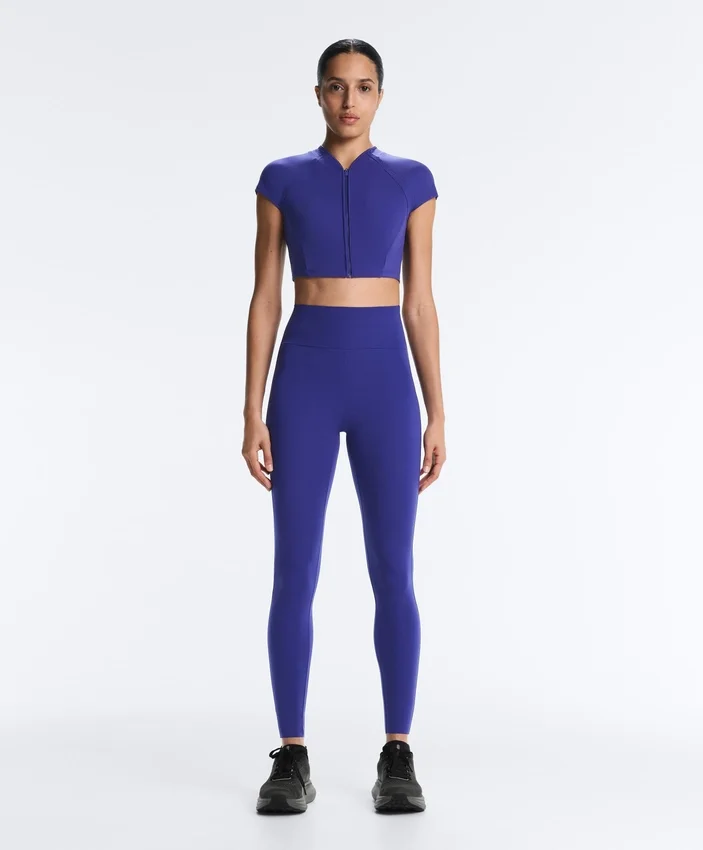 Compressive Leggings à taille haute et longueur cheville avec détails réfléchissants Compressive Leggings à taille haute et longueur cheville avec détails réfléchissants