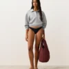 Culotte de bain à couverture moyenne avec découpe en U et passepoil Culotte de bain à couverture moyenne avec découpe en U et passepoil