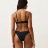 Culotte de bain à couverture moyenne avec découpe en U et passepoil Culotte de bain à couverture moyenne avec découpe en U et passepoil
