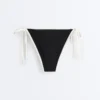Culottes de bikini à couverture moyenne avec bordures contrastées et liens