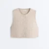 Gilets sans manches matelassés à motif vichy floral Gilets sans manches matelassés à motif vichy floral