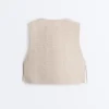 Gilets sans manches matelassés à motif vichy floral Gilets sans manches matelassés à motif vichy floral