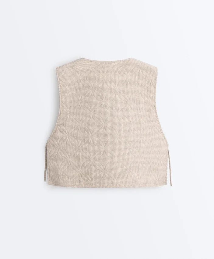 Gilets sans manches matelassés à motif vichy floral Gilets sans manches matelassés à motif vichy floral