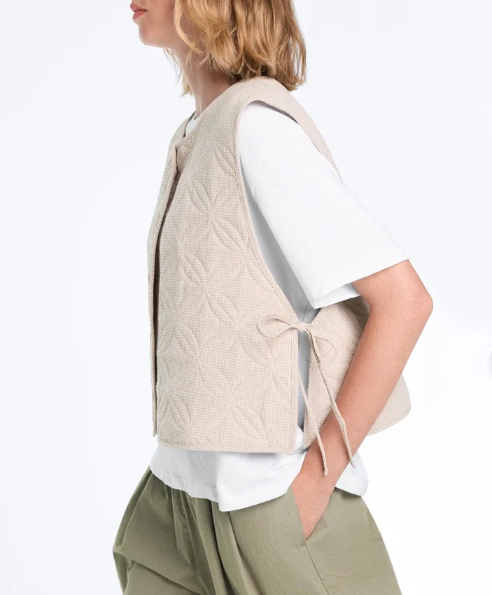 Gilets sans manches matelassés à motif vichy floral Gilets sans manches matelassés à motif vichy floral