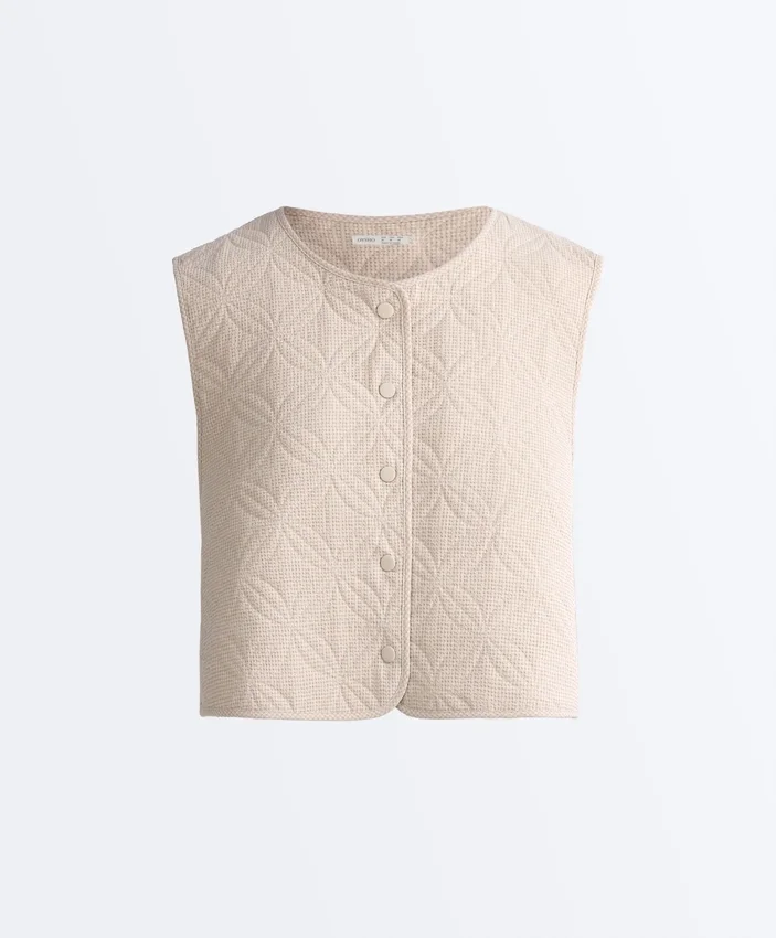 Gilets sans manches matelassés à motif vichy floral Gilets sans manches matelassés à motif vichy floral