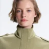 Gilets sans manches utilitaires en piqué avec ceinture en coton Gilets sans manches utilitaires en piqué avec ceinture en coton
