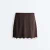 Jupe courte ondulée Compressive à taille haute Jupe courte ondulée Compressive à taille haute