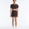 Jupe courte ondulée Compressive à taille haute Jupe courte ondulée Compressive à taille haute