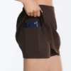 Jupe courte ondulée Compressive à taille haute Jupe courte ondulée Compressive à taille haute