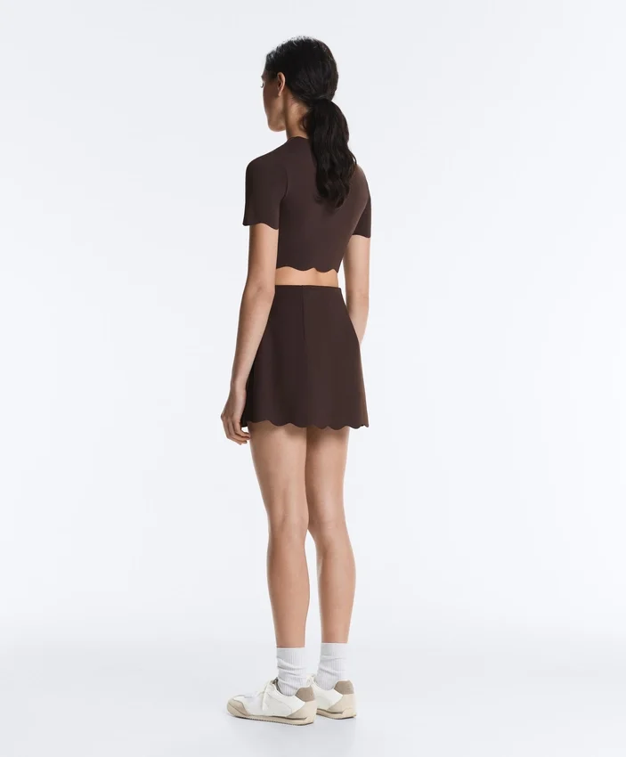 Jupe courte ondulée Compressive à taille haute Jupe courte ondulée Compressive à taille haute