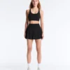 Mini-jupe compressive à taille haute et volants