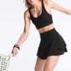 Mini-jupe compressive à taille haute et volants
