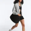 Mini-jupe compressive à taille haute et volants