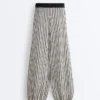Pantalon bouffant en maille rayée