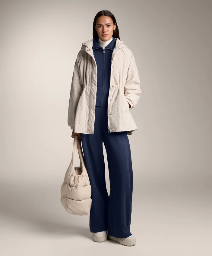 Pantalon cocon avec plis latéraux et modal brossé Pantalon cocon avec plis latéraux et modal brossé