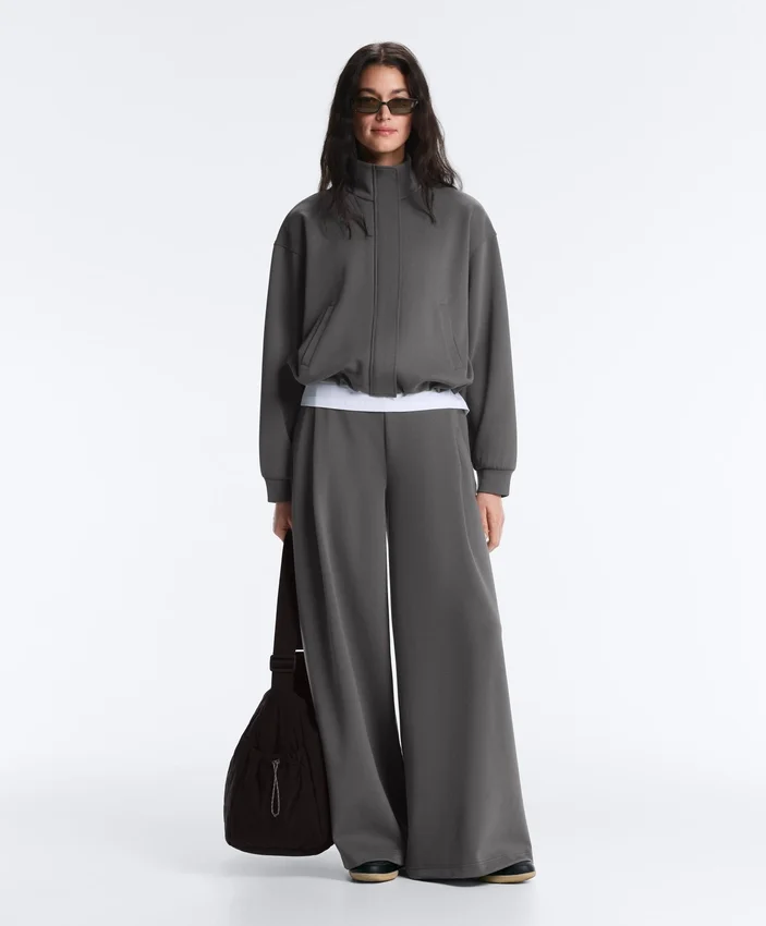 Pantalon en coton piqué à taille haute et jambes larges Pantalon en coton piqué à taille haute et jambes larges
