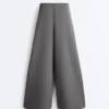 Pantalon en coton piqué à taille haute et jambes larges Pantalon en coton piqué à taille haute et jambes larges