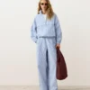 Pantalon à jambes larges en coton mélangé à rayures Pantalon à jambes larges en coton mélangé à rayures