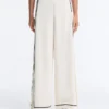 Pantalon à jambes larges en modal Soft Touch avec passepoil contrasté Pantalon à jambes larges en modal Soft Touch avec passepoil contrasté