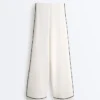 Pantalon à jambes larges en modal Soft Touch avec passepoil contrasté Pantalon à jambes larges en modal Soft Touch avec passepoil contrasté