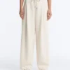 Pantalon à jambes larges en piqué plissé avec coton Pantalon à jambes larges en piqué plissé avec coton