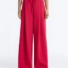 Pantalon à jambes larges en piqué plissé avec coton Pantalon à jambes larges en piqué plissé avec coton