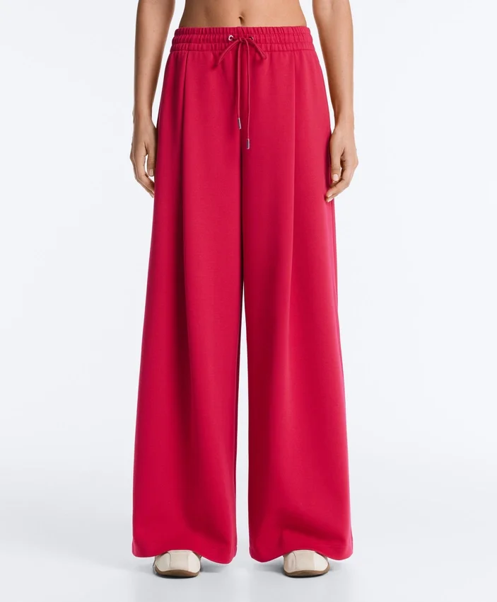 Pantalon à jambes larges en piqué plissé avec coton Pantalon à jambes larges en piqué plissé avec coton