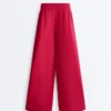 Pantalon à jambes larges en piqué plissé avec coton Pantalon à jambes larges en piqué plissé avec coton