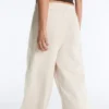 Pantalon à jambes larges en piqué plissé avec coton Pantalon à jambes larges en piqué plissé avec coton