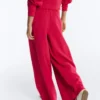 Pantalon à jambes larges en piqué plissé avec coton Pantalon à jambes larges en piqué plissé avec coton