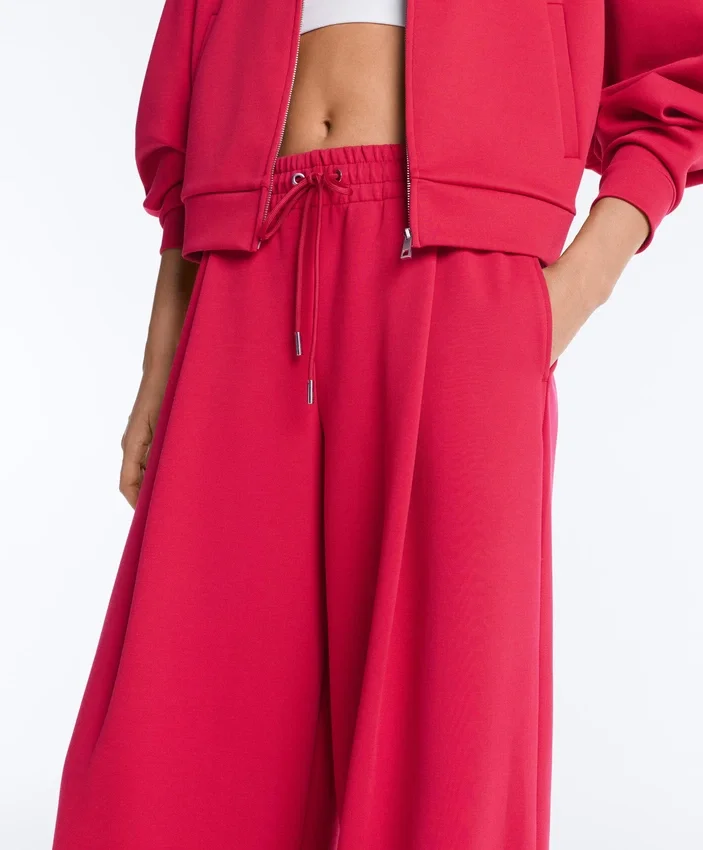 Pantalon à jambes larges en piqué plissé avec coton Pantalon à jambes larges en piqué plissé avec coton
