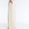 Pantalon à jambes larges en piqué plissé avec coton Pantalon à jambes larges en piqué plissé avec coton