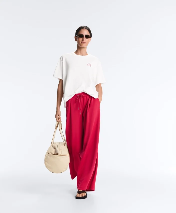 Pantalon à jambes larges en piqué plissé avec coton Pantalon à jambes larges en piqué plissé avec coton