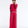 Pantalon à jambes larges en piqué plissé avec coton Pantalon à jambes larges en piqué plissé avec coton