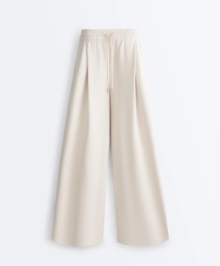 Pantalon à jambes larges en piqué plissé avec coton Pantalon à jambes larges en piqué plissé avec coton