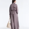 Veste en modal Soft Touch avec taille ajustable et col montant Veste en modal Soft Touch avec taille ajustable et col montant