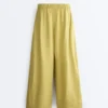 Pantalon large 100 % lin avec plis latéraux Pantalon large 100 % lin avec plis latéraux