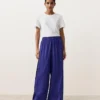 Pantalon large 100 % lin avec plis latéraux Pantalon large 100 % lin avec plis latéraux