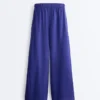 Pantalon large 100 % lin avec plis latéraux Pantalon large 100 % lin avec plis latéraux